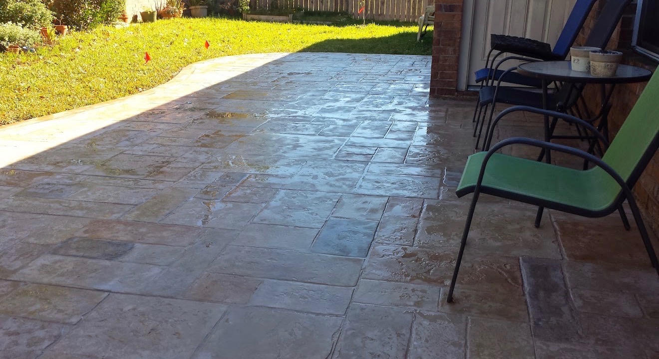 Gloss sealed backyard stamped concrete patio